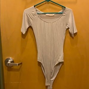 Gray and yellow body suit. Good quality